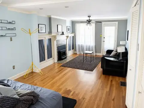 The same room brightened and color-corrected by Stylst