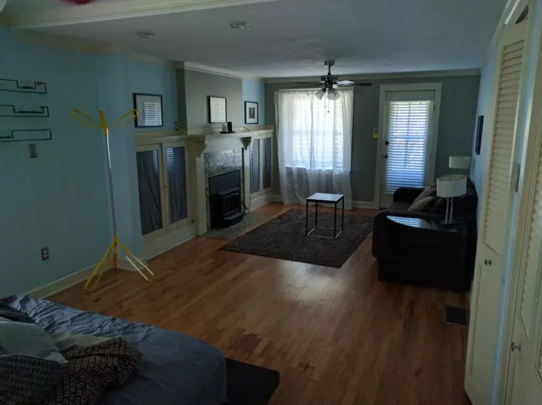 Dark living room listing photo before enhancement