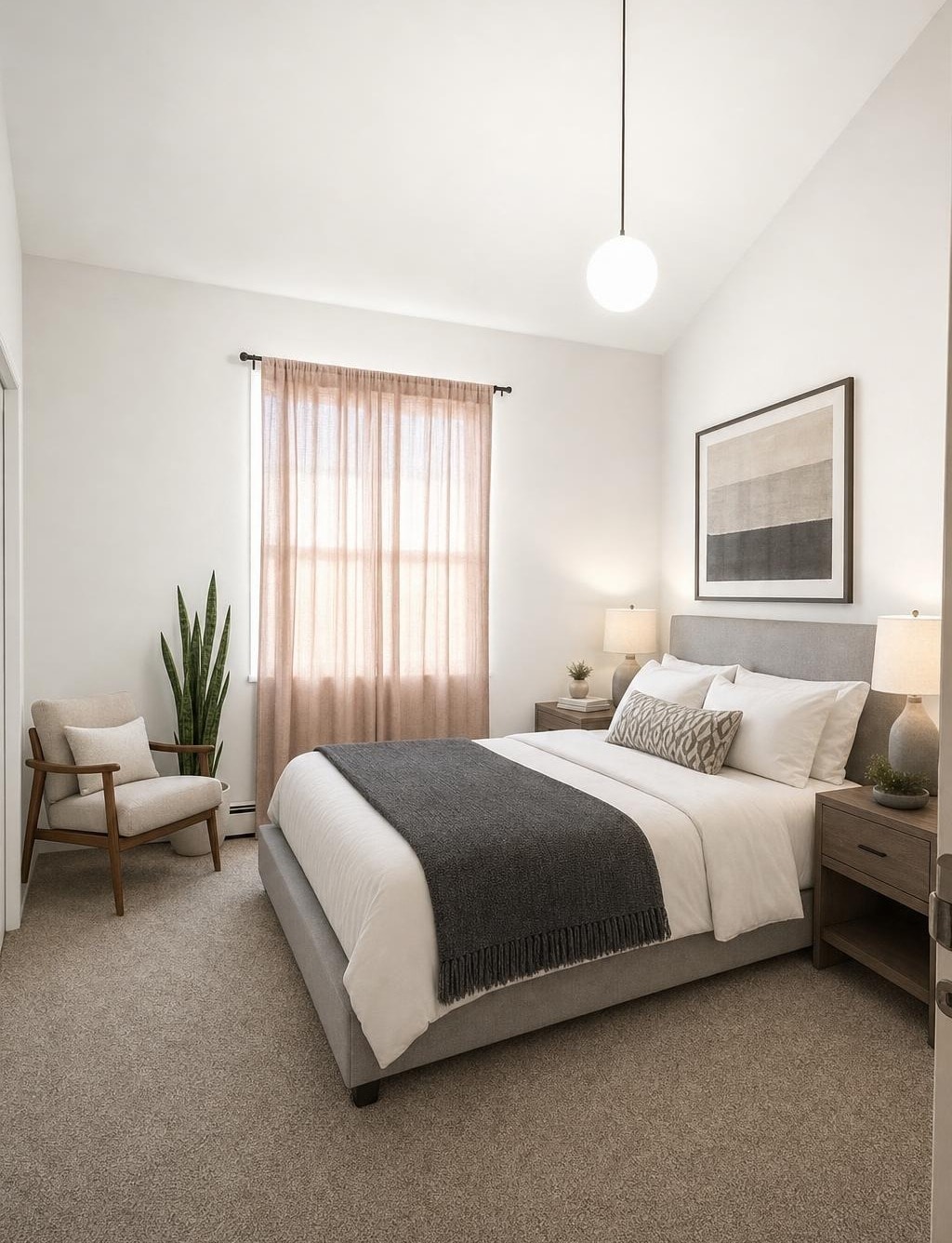 Modern bedroom with gray upholstered bed, wood nightstands, beige curtains, armchair, and textured wall art.