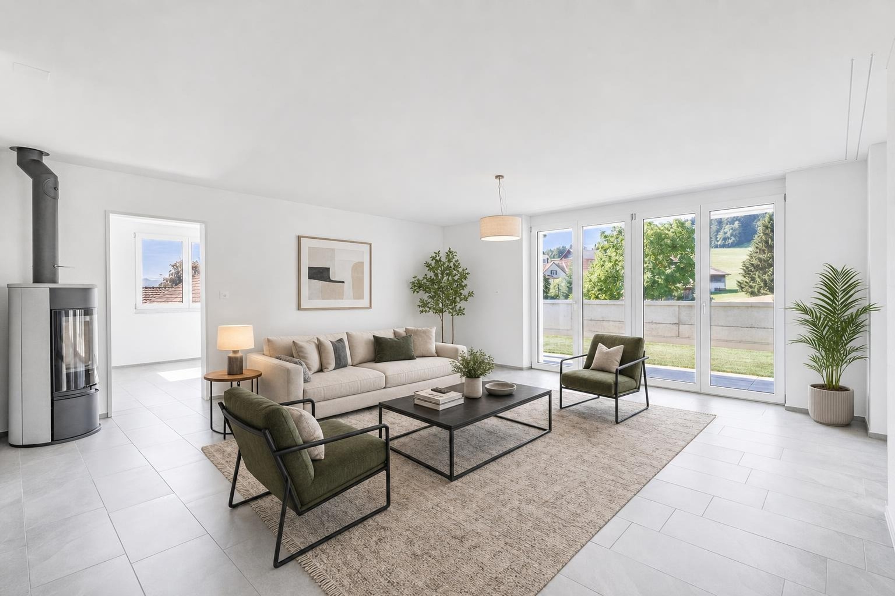 Bright modern living room with beige sofa, two olive green armchairs, black metal coffee table, large windows, and potted plants.