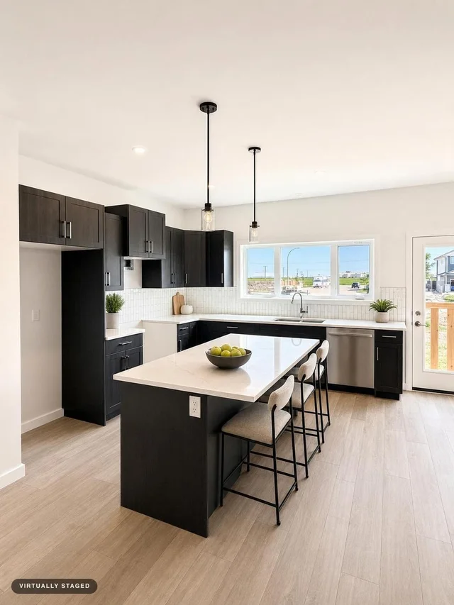 Modern kitchen with dark cabinets, white marble-look island, three upholstered counter stools, two pendant lights, and wood-tone floor.