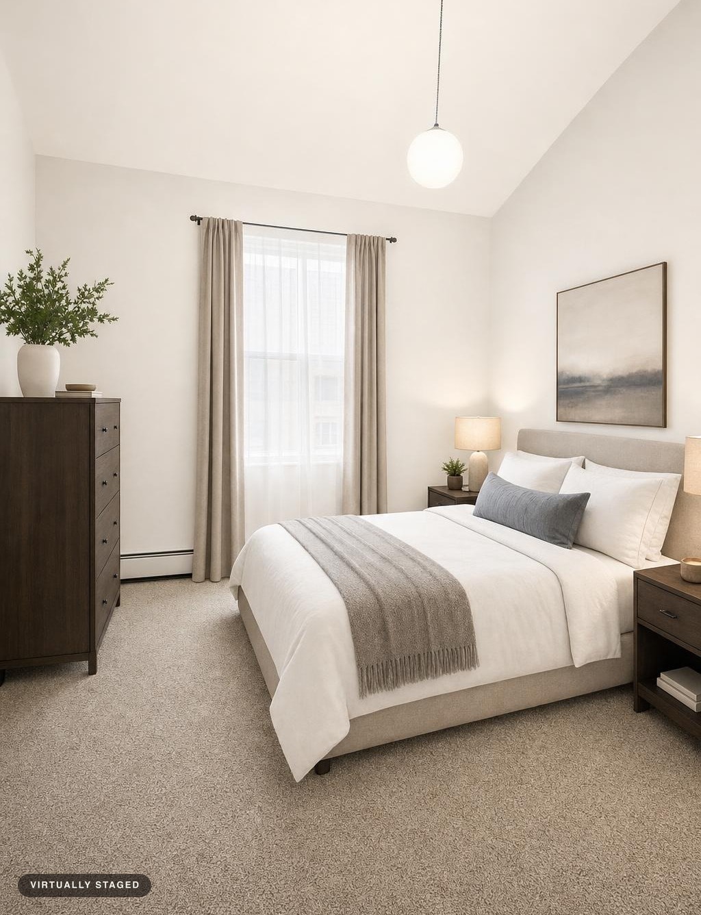 Modern bedroom with beige upholstered bed, soft gray throw, dark wood dresser, nightstands, and neutral curtains.